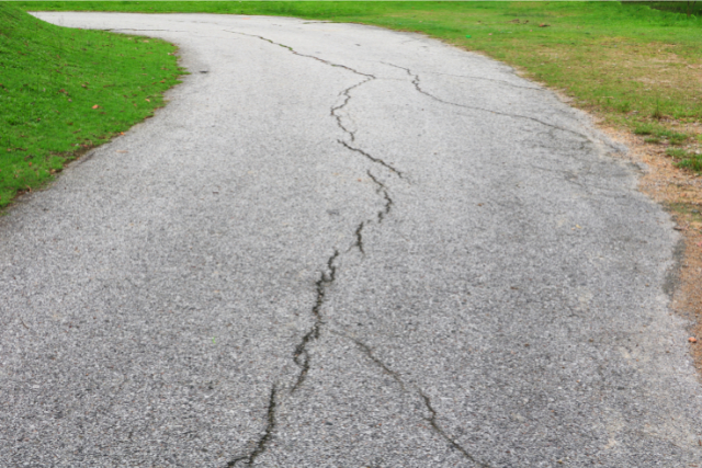 Residential Cracked Driveway needing repairs